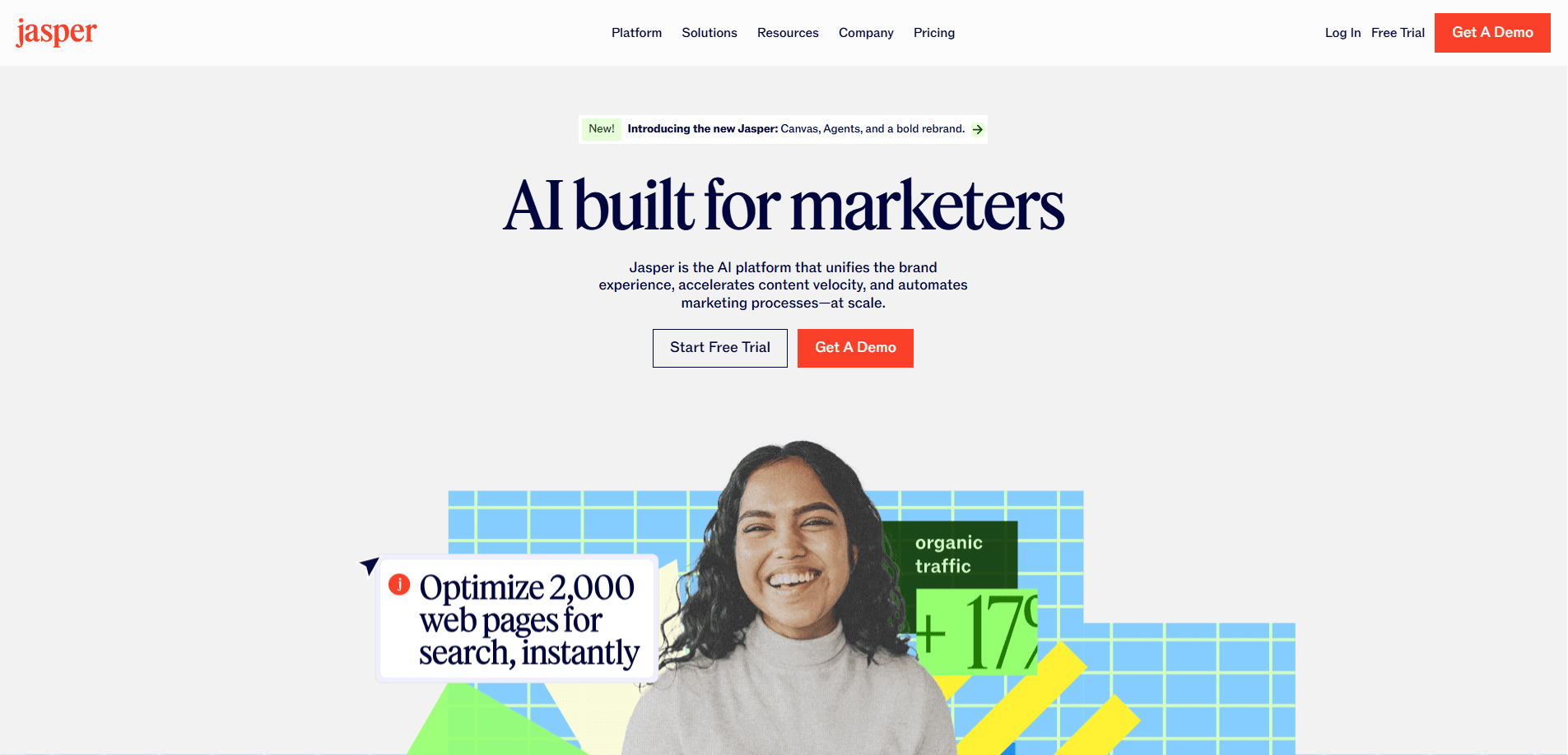 A smiling woman stands before colorful graphics and charts highlighting “Optimize 2,000 web pages for search, instantly.” The Jasper website header reads, “AI built for marketers,” showcasing AI Website Design with links for a free trial and demo.