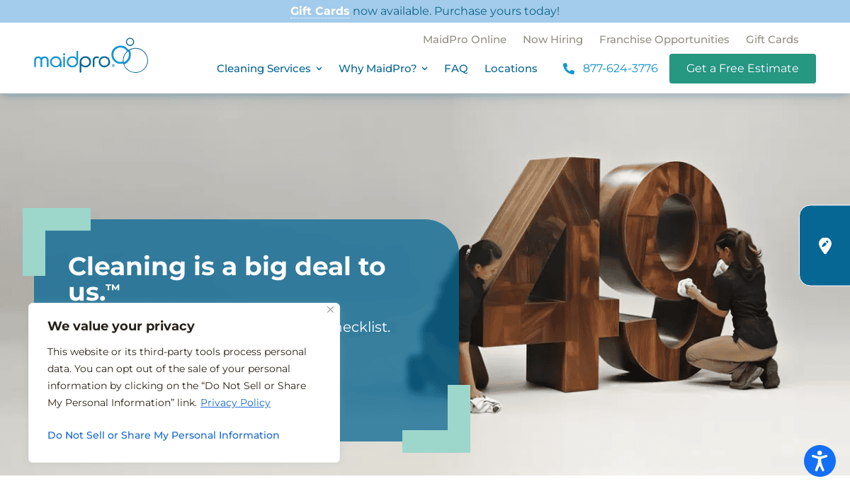 A Cleaning Service Website page shows two women dusting a large wooden sculpture of the number 49. Text reads Cleaning is a big deal to us. A privacy notice popup appears in the lower-left corner, reflecting thoughtful website design.