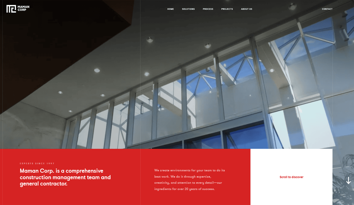 Screenshot of Maman Corp.’s website homepage, featuring modern glass ceilings and large windows above a bold red and white section with text detailing their professional commercial construction management and general contractor services.