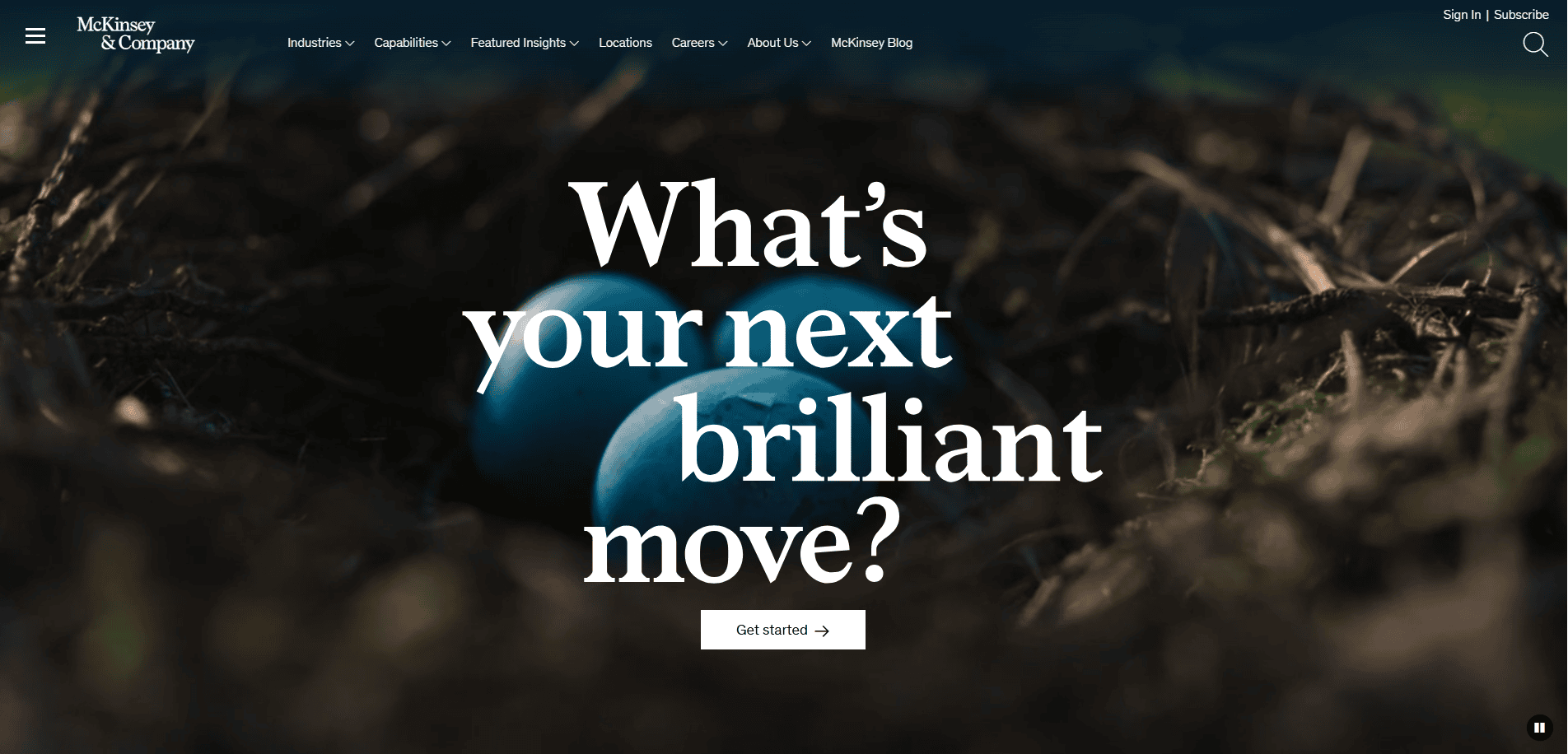 A close-up of two blue eggs in a bird’s nest with the text, “What’s your next brilliant move?” in large white font, plus a “Get started” button. Perfect inspiration for Consultant Website Design to help you wins clients. McKinsey & Company’s menu tops the page.