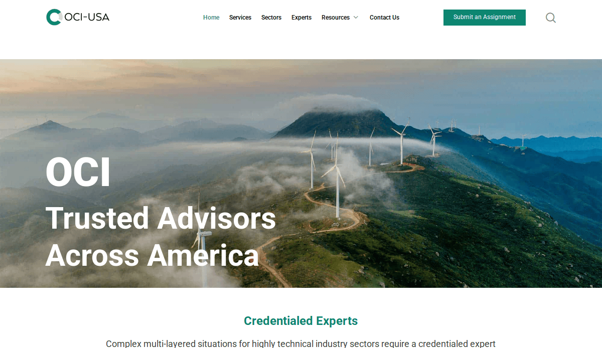 Homepage of OCI-USA, a civil engineering website, features wind turbines on a green mountain ridge with fog and clouds in the background. Foreground text reads, OCI Trusted Advisors Across America.