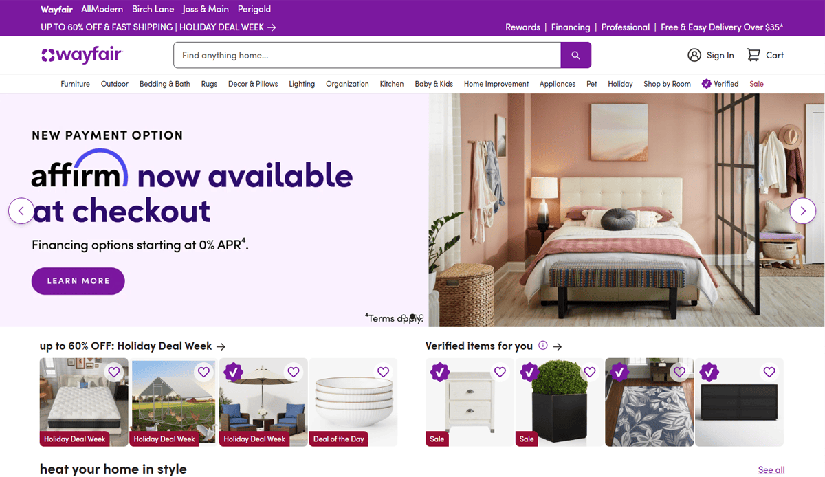 Screenshot of the Wayfair homepage showcasing their furniture website design, with a banner about Affirm financing, a pink-themed styled bedroom, and home products on sale below—each with promotional tags for easy browsing.