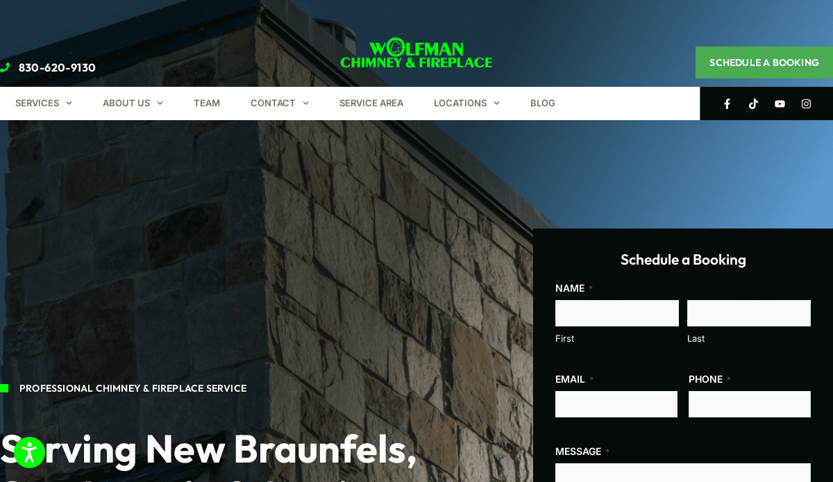 Website homepage for Wolfman Chimney & Fireplace featuring an eye-catching stone chimney, company logo, contact number, menu items, and a booking form—all on a sleek dark background. Experience masonry website design that converts visitors into customers.