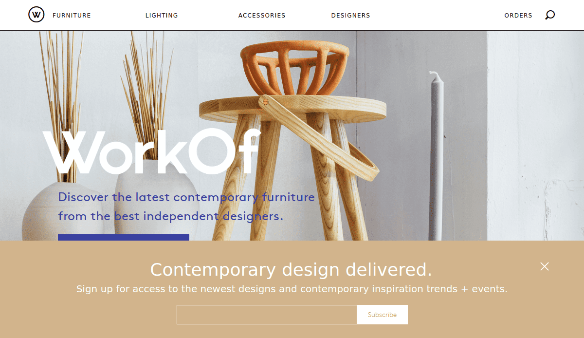 A modern artisan website design homepage featuring wooden furniture, vases, and candles. Text reads: WorkOf. Discover the latest contemporary furniture from top independent designers. A subscription box overlays the bottom.