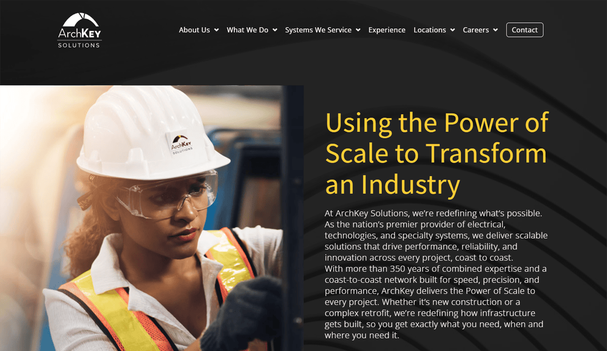 A woman in construction safety gear reviews plans on a tablet. Next to her, yellow text reads, “Using the Power of Scale to Transform an Industry.” The ArchKey Solutions logo and "Site That Converts" appear in the top left.