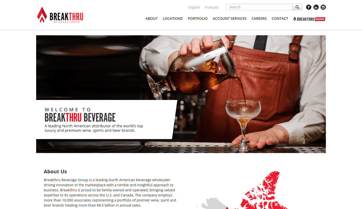 A bartender in a white shirt and brown apron pours an amber drink from a mixing glass into a cocktail glass. The Beverage Distributor Website Design features Breakthru Beverage branding with navigation links to boost user engagement.