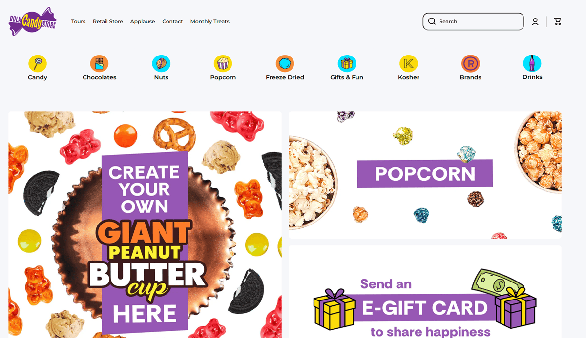 Homepage showcases candy and snack categories with chocolates, nuts, popcorn, and drinks. Eye-catching banners highlight a giant peanut butter cup, popcorn, and e-gift cards—perfect for boosting your online presence with playful Candy Website Design.