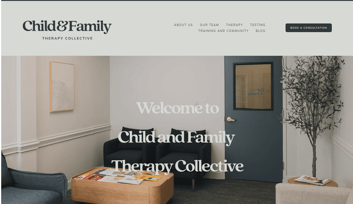 A modern therapy office waiting room with a sofa, armchair, coffee table, magazines, and wall art creates a welcoming space. The SEO-optimized psychotherapist website design features clear navigation links and a Book a Consultation button.