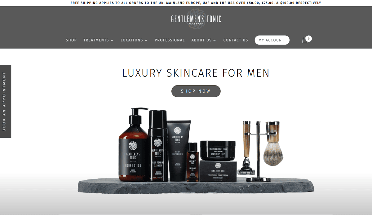 A website homepage for Gentlemens Tonic showcases luxury skincare products for men on a stone tray, paired with shaving accessories. Reflecting premium Barber Shop Website design, the page features a Shop Now button and navigation menus at the top.