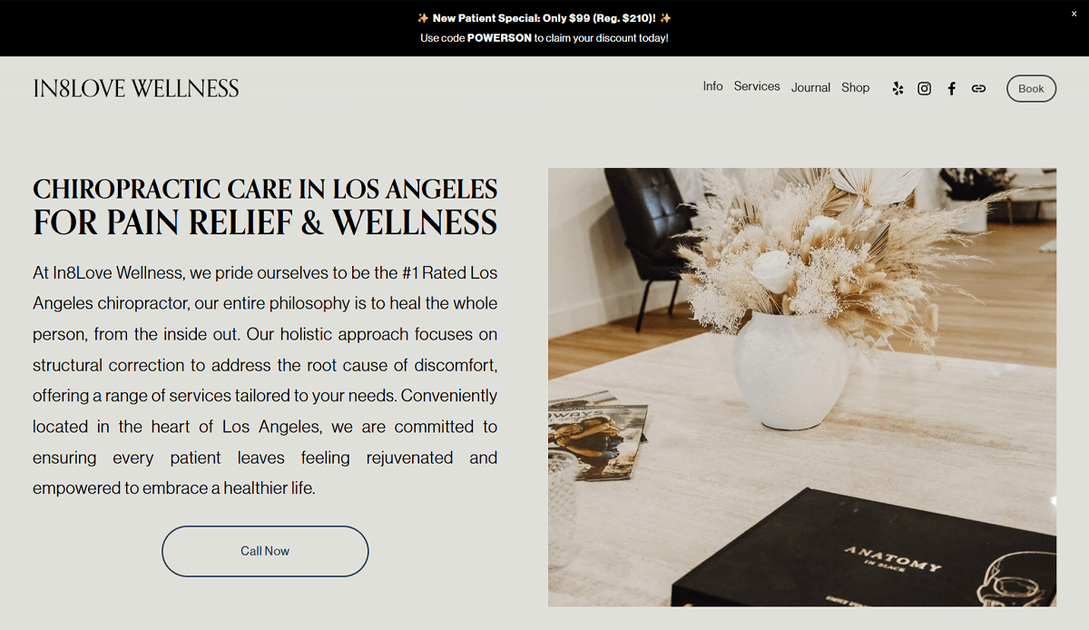 Screenshot of a wellness website for In8Love Wellness, featuring dried flowers, a decorative tray, and books. The SEO-optimized headline promotes chiropractic care in Los Angeles for pain relief and wellness, with navigation links visible.