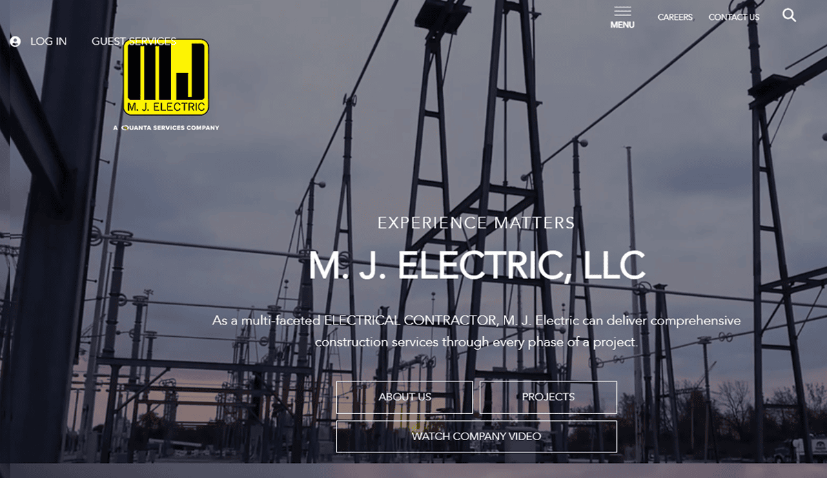 A website homepage for M.J. Electric, LLC features electrical substation equipment with power lines at sunset. Showcasing strong website design, the site navigation and company logo invite visitors to learn more or watch a video about this commercial electrician.