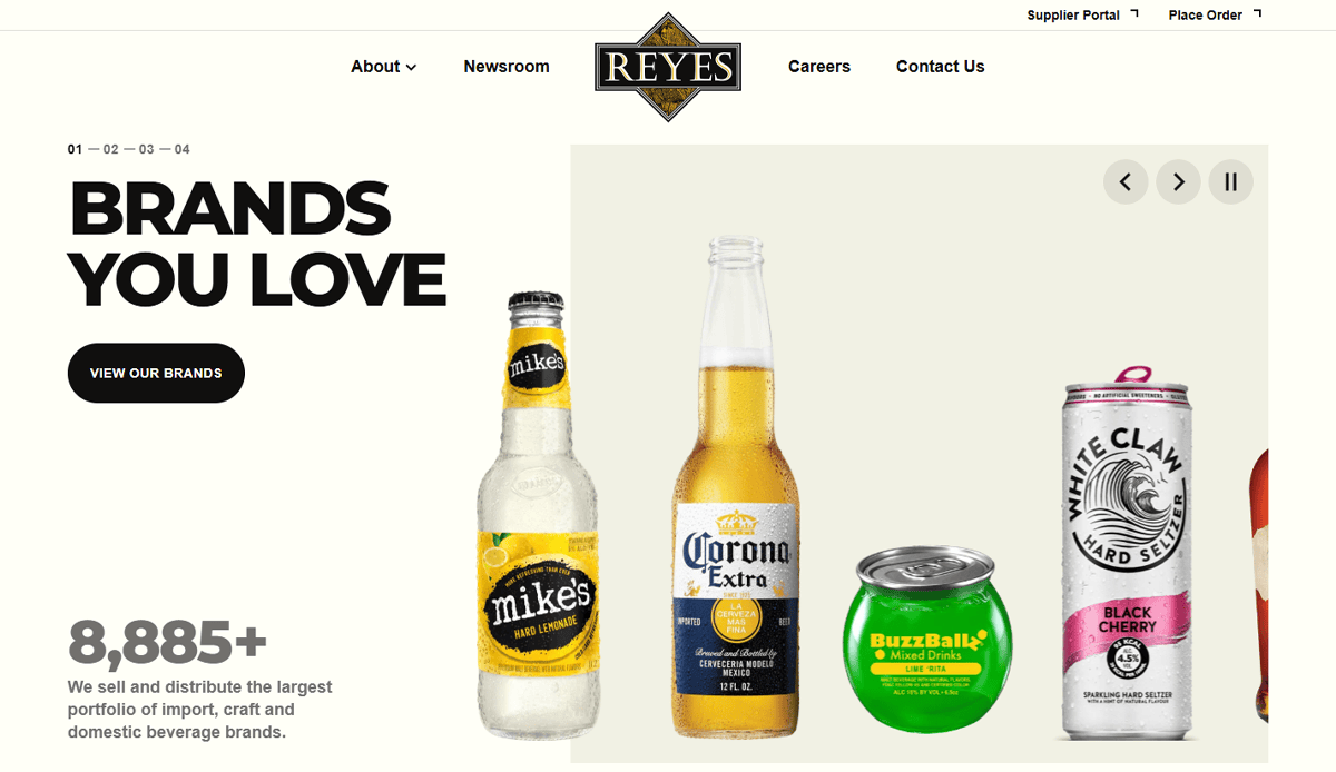 A website page for Reyes, a leading beverage distributor, features bottles and cans of Mikes Hard Lemonade, Corona Extra, BuzzBallz Chiller, and White Claw Hard Seltzer under the headline Brands You Love and a View Our Brands button.