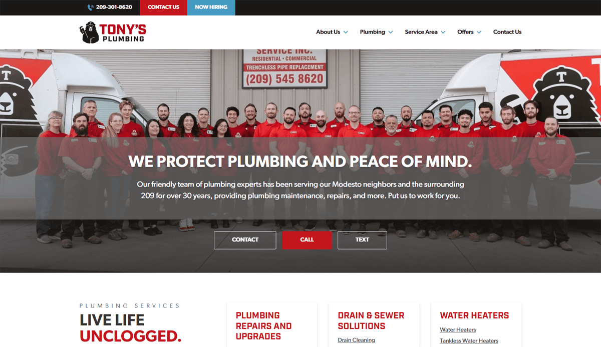 A group of plumbing company employees in red shirts stand in front of two white service vans. The website header reads Tony’s Plumbing with a slogan about protecting plumbing and peace of mind, showcasing expert Plumbing Website Design.