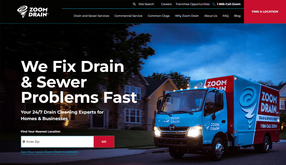A Zoom Drain service truck is parked on a residential street at dusk. Showcasing high-conversion Plumbing Website Design, the site reads, We Fix Drain & Sewer Problems Fast, with a zip code search box and navigation bar at the top.