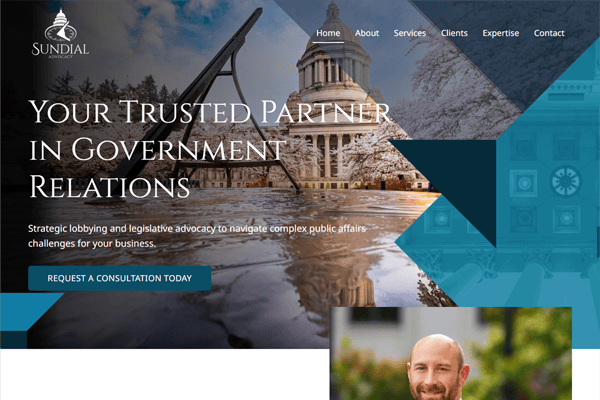 Website homepage for Sundial, featuring a government building, text offering government relations services, and a blue “Request a Consultation Today” button. There is also a small photo of a smiling bald man at the bottom right.